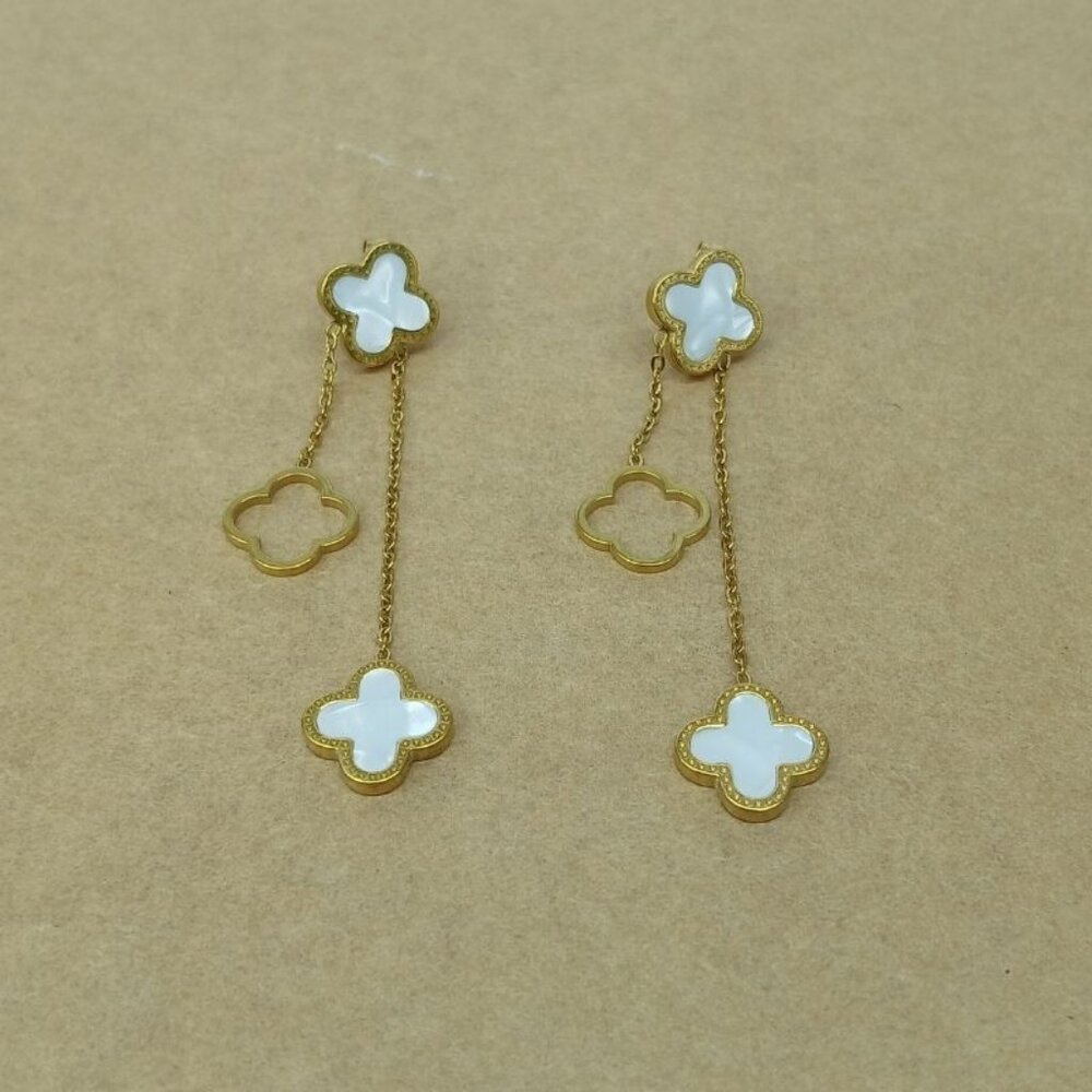 Stainless steel earrings , New with tags , color gold and black